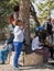 Believer lifts her hands to heaven during prayer in Monastery Carmel Pater Noster garden on Mount Eleon - Mount of Olives in East