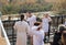 Believers arriving at the Epiphany Rite use Holy Water for ablution from the Jordan River on the Baptismal Site of Jesus Christ