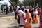 Believers welcome the bishop in front of Our Lady of Lourdes Church in Kumrokhali, India