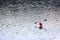 BELIS-FANTANELE, ROMANIA, AUGUST 12, 2023: Red kayak on Belis-Fantanele dam lake, Ocidental Carpathians, Romania, Europe.