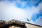 Bell Canada logo on a satellite dish on a house in Montreal, Quebec.