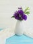 Bell, chrysanthemum vase on a wooden background decoration