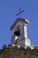 Bell & Cross on Tiled Roof in France