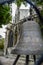 Bell at Notre Dame Cathedral side doorway in Paris