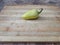 Bell pepper on a wooden surface. Fresh peppers on a cutting board. Bell peppers for salads, soups, pizza and ketchup.