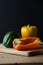 Bell Peppers Arrangement on Wooden Board