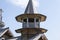 The bell ringer rings the bells in the bell tower of the chapel of the Archangel Michael. Kizhi Island. Republic of Karelia. Russi