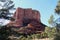 Bell Rock, a red sandstone mountain formation, in the late afternoon on the Courthouse Butte Loop Trail in Sedona