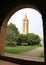 bell tower of the abbey of Pomposa surrounded by an arc of the m