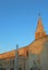 Bell tower of the ancient basilica of St. Euphemia in the town o