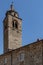The bell tower of the ancient Pieve di San Giovanni Battista in the historic center of Buti, Pisa, Italy