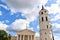 The bell tower of the Cathedral and the Cathedral Basilica of St Stanislaus and St Ladislaus on the Cathedral Square against the b