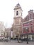 Bell tower with clock of the church of Saint Catherine in Brussels. March 22, 2013. Brussels, Belgium. Vacation Nature Street