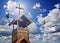 A Bell Tower with Cross, Heavenly Light and Doves