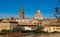 Bell tower and dome of Tarazona Cathedral rising above residential buildings