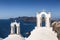 The bell tower Greek Orthodox Church in the small town of Oia in Santorini, Greece