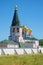 The bell tower Iversky Svyatoozersky Mother of God Monastery closeup, july day. Valday, Russia