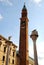 Bell tower in the midst of the columns with lion statue in Piazza dei Signori in Vicenza in Veneto (Italy)