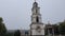 The bell tower near the Metropolitan Cathedral Nativity of the Lord with the view to the Triumphal Arch in Chisinau, Moldova. Hist