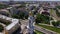 bell tower of orthodox church or monastery in center of old russian city, aerial view in summer day