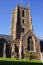 The bell tower of the Priory Church of St George in Dunster, Somerset UK