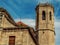 Bell tower of Santa Maria de Alba church in Tarrega Province of Lleida, Catalonia, close-up. Baroque-style medieval temple,