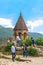 Bell tower of a single-nave Church in Ananuri with beautiful arches with 8-sided columns