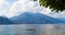 Bellagio, Italy - 13 August 2013: group of people dive from a trampoline in the lake of Como in Bellagio