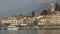 BELLAGIO, ITALY - CIRCA February 2017: a touristic boat reaches the pier of the village of Bellagio on the lake Como