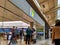 Bellevue, WA / USA - circa November 2019: Exterior view of a Microsoft Store entrance as customers enter, shopping for new