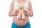 The belly asia pregnant woman holdind a teddy bear doll isolate