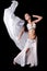 Belly Dancer Dancing with Flowing White Silk Veil