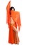 Belly dancer wearing orange costume and veil