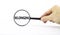 Belonging and inclusion symbol. Magnifying glass with word belonging on a beautiful white background. Businessman hand. Business,