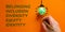 Belonging symbol. Businessman writing `identity, equity, diversity, inclusion, belonging`, orange background. Light bulb icon.