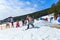 BELORETSK,RUSSIA, 13 APRIL 2019 - young man with a bare torso rides a snowboard , closing the ski season in the Ural mountains