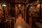 Below decks, rich mahogany walls line the hallways and cabins. Precious maps and navigational equipment occupy their own dedicated