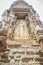 Below view of a whiute budha carved in a wall in the main Prang at Wat Racha Burana, Ayudhya Province