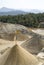 Belt conveyors and a piles of rubble and stone meal in Gravel Quarry