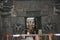 BELUR, KARNATAKA, INDIA, May 2016, Hindu priest at main shrine of god Vishnu, Chennakeshava temple with visible Ornate doorjamb, l