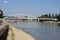 Belvarosi Hid bridge, also known as Downtown bridge on the tisza river during a sunny afternoon. The bridge connects the two parts