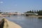 Belvarosi Hid bridge, also known as Downtown bridge on the tisza river during a sunny afternoon. The bridge connects the two parts