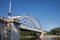 Belvarosi Hid bridge, also known as Downtown bridge on the tisza river during a sunny afternoon. The bridge connects the two parts