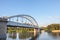 Belvarosi Hid bridge, also known as Downtown bridge on the tisza river during a sunny afternoon. The bridge connects the two parts