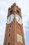 Belvedere ancient clock tower low angle view in Mondovi, Italy