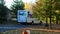 BEMIDJI, MN - 8 OCT 2020: FedEx truck van drives on residential street.