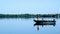 Bemidji, MN - July 30, 2018: Fisherman in fishing boat enjoying a beautiful morning