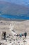 BEN NEVIS, SCOTLAND - SEPTEMBER 01 2021: Hikers making their way up the main track towards the summit of Ben Nevis on a hot, clear