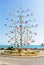 BENALMADENA, SPAIN - FEBRUARY 15, 2014: Benalplaya Roundabout, a pinwheel in the street of Benalmadena and a view to a promenade