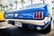 Benalmadena, Spain - June 21, 2015: Back view of classic Ford Mustang in blue color.